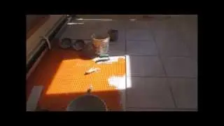 How to install a large format ceramic tile on Shluter Ditra XL