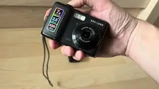 Samsung D75 SHD lens zoom 7.2MPx ASR black vintage retro old digital photocamera point shoot device