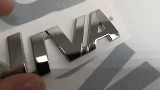 Шильдик Орнамент NIVA (хром)