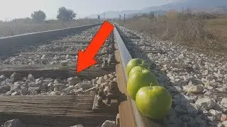 EXPERIMENT TRAIN VS APPLES Loram rail grinder under train view