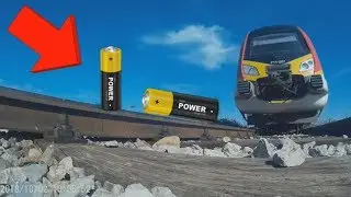 EXPERIMENT TRAIN VS AA BATERIES Loram rail grinder under train view
