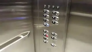 Modded!  Dover HIGHdraulic elevators (main bank) at Rivers Landing garage, Sioux City IA