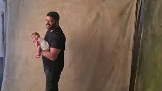 How to pose parents with a baby