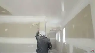 Rolling After Spraying Paint On Ceilings & Walls Fresh Drywall