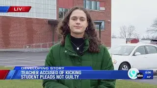 Teacher accused of kicking student pleads not guilty