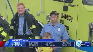 New Haven volunteer firefighter paying his respects to the fallen on 9/11