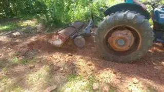 Long 310 Tractor tilling the garden - Great Sound!