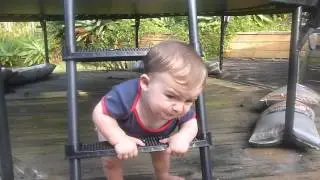 My baby brother getting stuck in our trampoline ladder