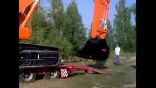 Разгрузка экскаватора