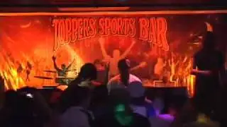Pryce performing atToppers sports bar TX