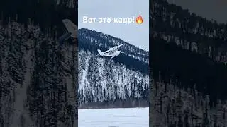 Гидросамолёт на лыжах над Телецким озером.