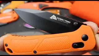 Lookout Benchmade! $10 Walmart Ozark Trail "Axis Lock Bugout?" D2 steel, orange scales, scary sharp.