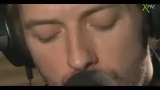Chris Martin performing Talk acoustic live at XFM in 2009