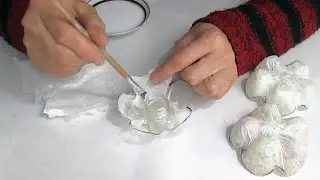 A chic idea from a plastic pipe, plastic bottles and napkins