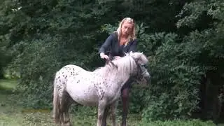 C®uel women riding horse. Part-7 