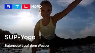 Herabschauender Hund auf dem SUP?